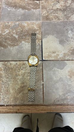 nixon silver/gold watch