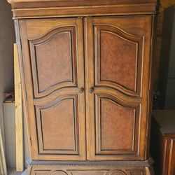 Armoire. Very sturdy. Real wood.
