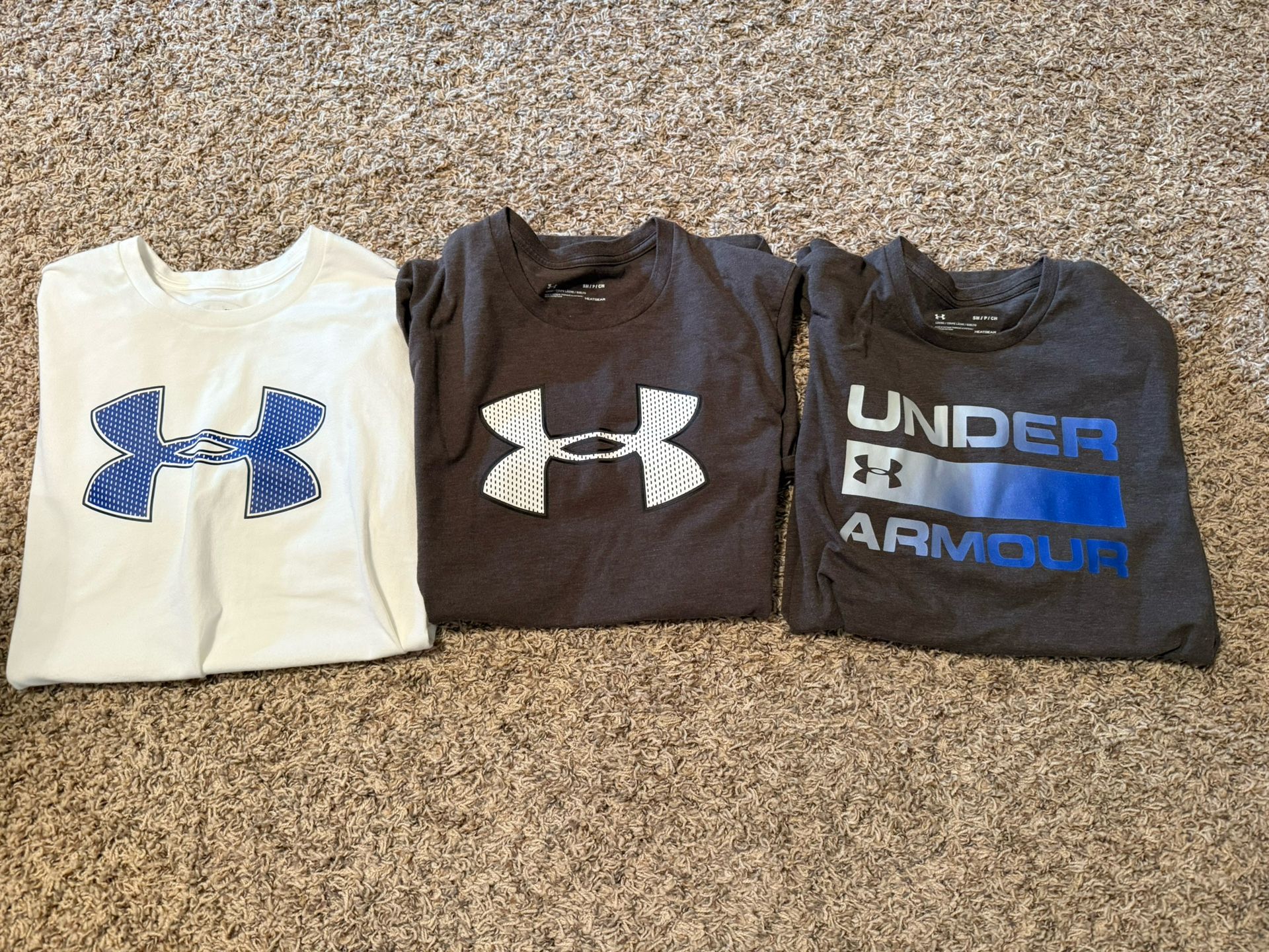 3 UNDER ARMOUR SHIRTS.