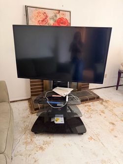 55” Samsung TV + 3-Tier Glass TV Stand – $175 OBO