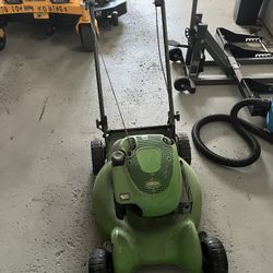 Lawn Boy Older One The Good Ones Not The Junk New Ones. Runs Great Only Thing Wrong With It I Took The Bar And Cable Off It So Shut Off Manually
