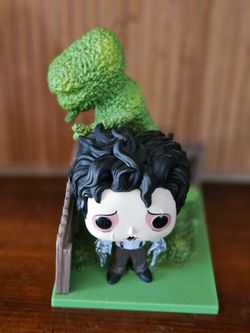 Funko Pop! Deluxe vinyl figure set featuring Edward Scissorhands and his Dinosaur Shrub creation.