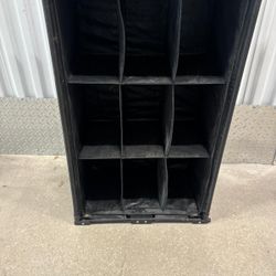 Collapsible shoe rack holds 12 pairs of shoes.. 20” wide , 12” depth , 33” high . $20