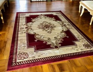 Beautiful, Brand New In plastic Area Rug