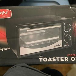 NEW IN BOX TOASTER OVEN
