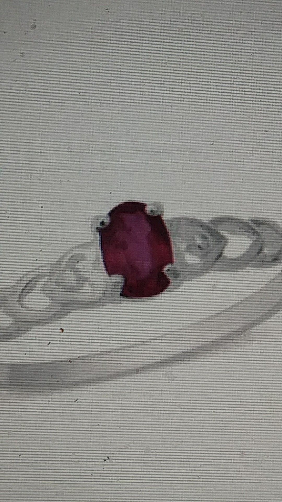 NWT-NIASSA RUBY SOLITAIRE RING IN STERLING.