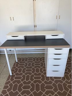 White/navy Ikea desk with drawers