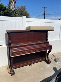 Must pickup . Free upright piano