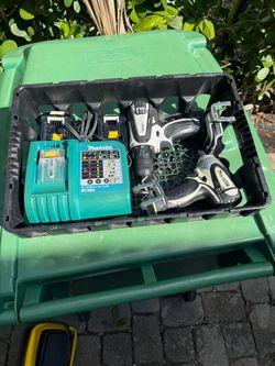 Makita 18 volt drill & impact gun along with 2 batteries and charger.
