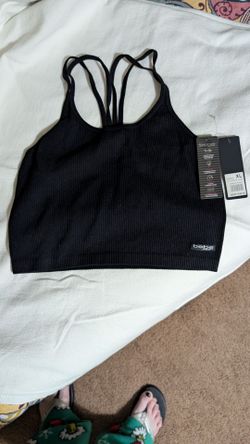 Bebe Sport Seamless Rib Bra in black.