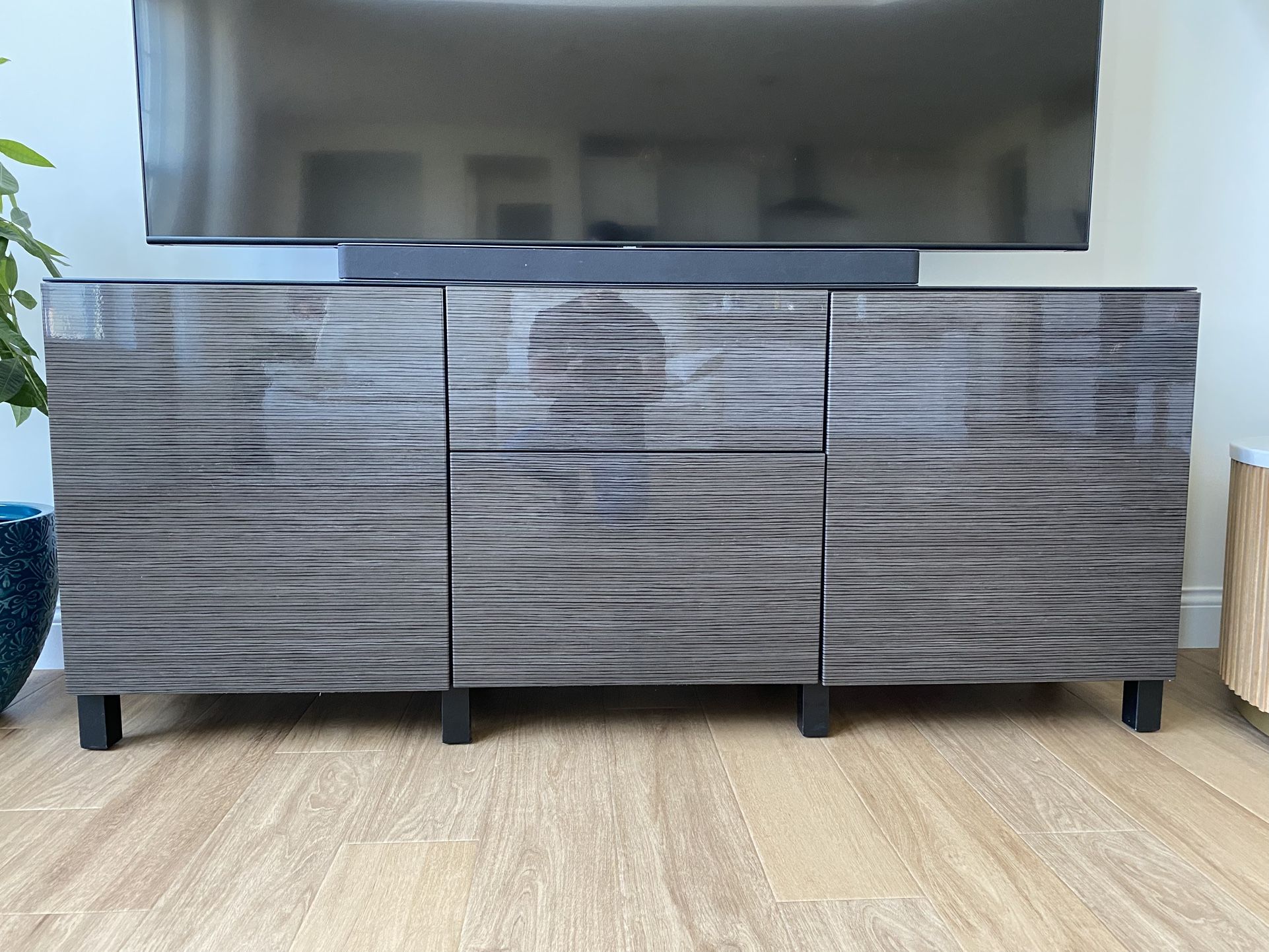 $175 - Premium High gloss Storage combination TV stand with glass top.