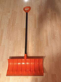 Snow shovel with metal edge