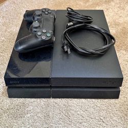 Playstation 4 With Controllers And All The Wires