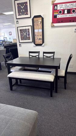 Dining table with 4 chairs and a bench