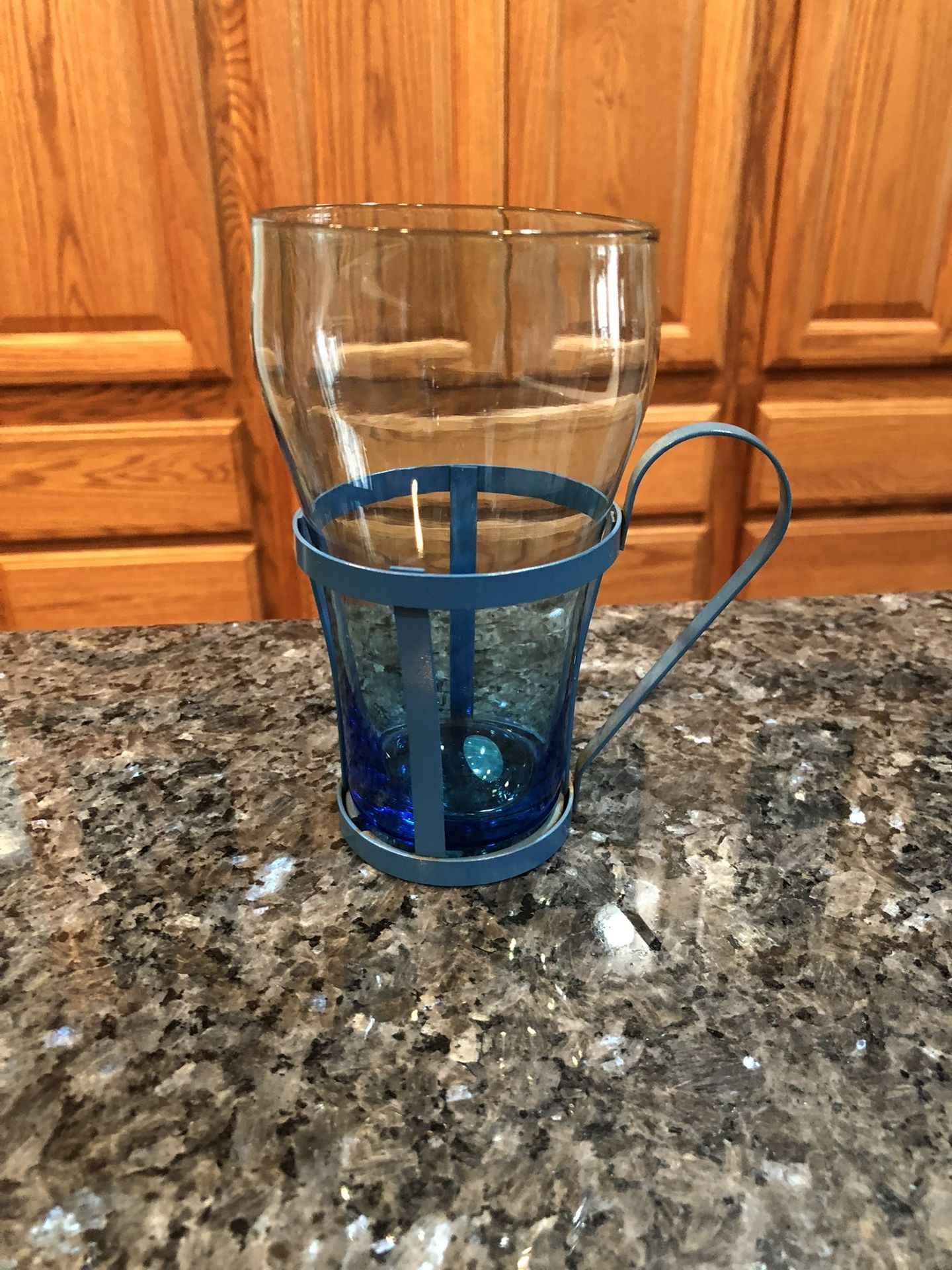 Vintage 1950’s Glass Cup with Metal Holder With Handle. Size 5 1/2 inches tall. Never Used With Sticker On The Bottom “Counterpoint San Francisco”.