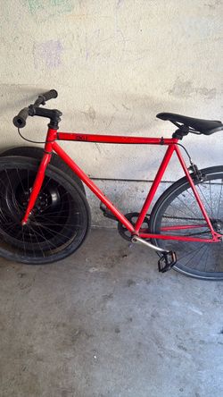 This is a red 6KU Cayenne Fixie bike.