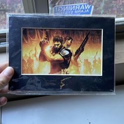 Limited edition resident evil 5 laser cel in plastic