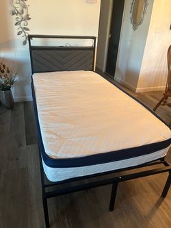 Twin bed with mattress like new
