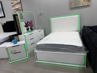 4pc Queen Bedroom Set With remote-controlled colorful LED lighting to set the mood.