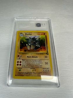 TAG 10 Rhydon 1999 1st Edition 45/64 Jungle Pokemon MP