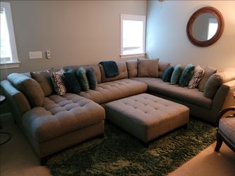 Pristine Gray Sectional With Matching Ottoman