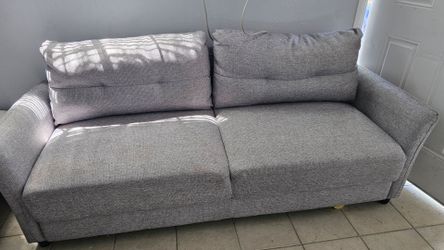 Small grey couch.