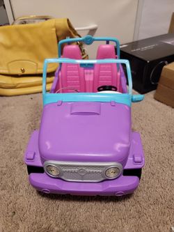 Purple Barbie car. One Barbie included.