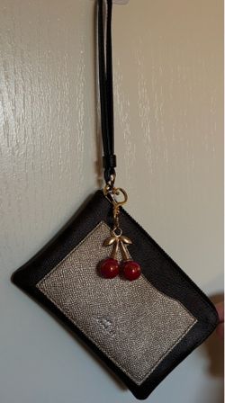 Coach Wristlet Wallet in dark brown, black, and metalic