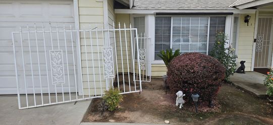 White Wrought Iron window security
