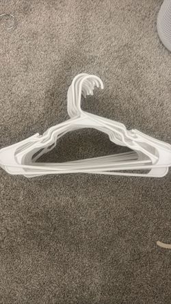 25 Clothing hangers white