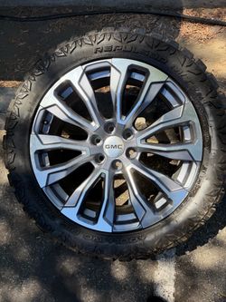 Gmc sierra rims and tires basically new