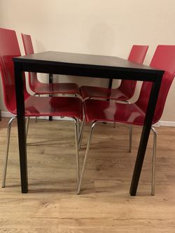 Black table metal frame and chairs