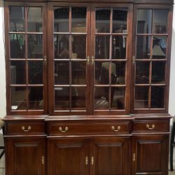 china cabinet and table with chairs 