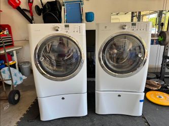 Electrolux washer and dryer with storage pedestals