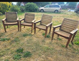 Outdoor crate barrel teak chairs
