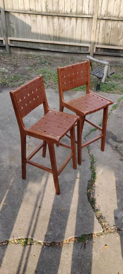 These are solid teak wood and hand woven leather made very, well both $180