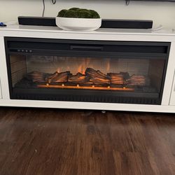TV stand with fireplace.