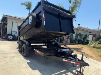 Dump trailer sky 12 by 6 by 4 tittle in hand