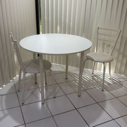 Table And Two Chairs