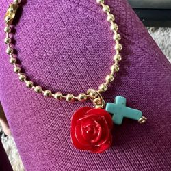 Rolling Stone Golfilled Chain With A Rose And A Cross Pendant 