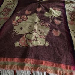 Hello kitty poncho  adult