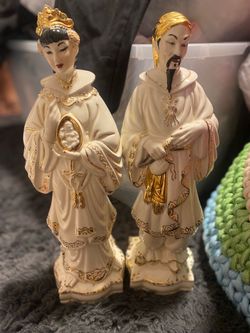 Pair of Asian Ceramic Figurines with Gold Accents