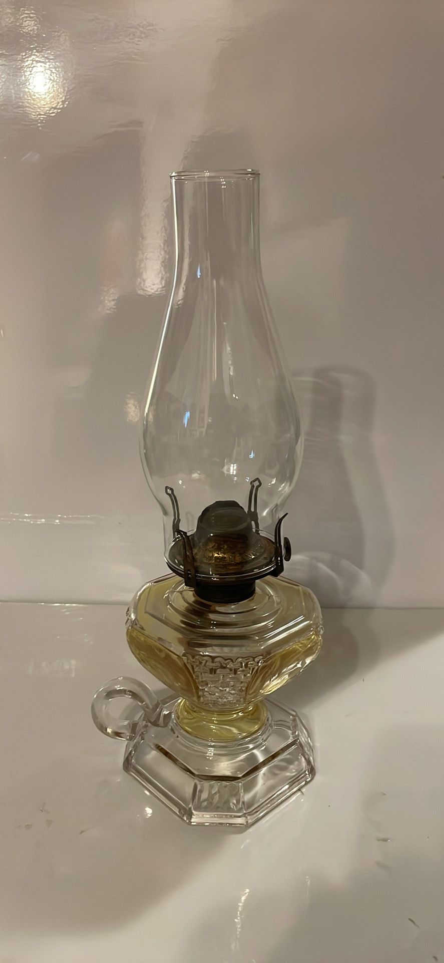 Vintage Chamber/Hurricane Glass oil lamp w/ glass chimney and yellow tinted reservoir. Like new.p/u 