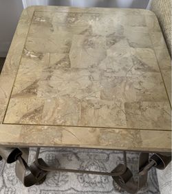 Fossil stone with brass base end tables Asking $50 for both