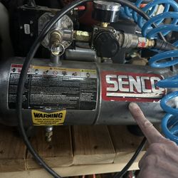 Senco PC1010 portable electric air compressor.