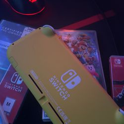 BRAND NEW NITENDO SWITCH LITE USED 2-3 TIMES WITH GAMES 