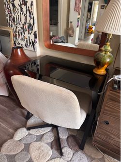 Cream colored tweed chair w/ black glass computer table