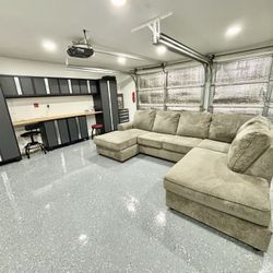 Gray Ashley Furniture U-Shaped couch.