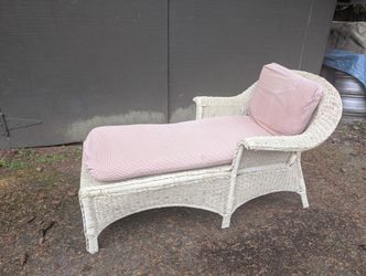 Wicker chaise lounge.