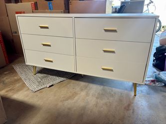 White and gold dresser
